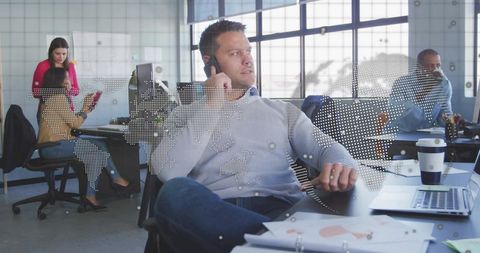 Corporate Professional on Phone in Innovative Office Setting