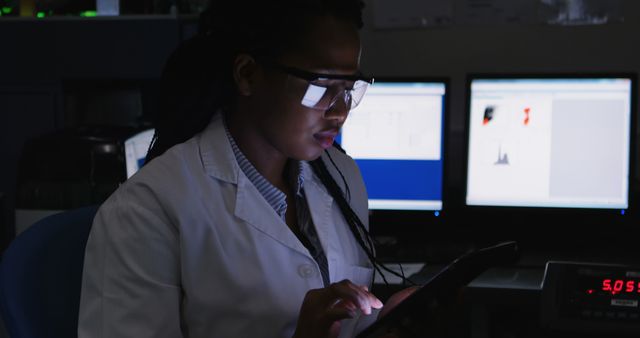 Female Scientist Working on Digital Tablet with Computers in Lab - Download Free Stock Images Pikwizard.com