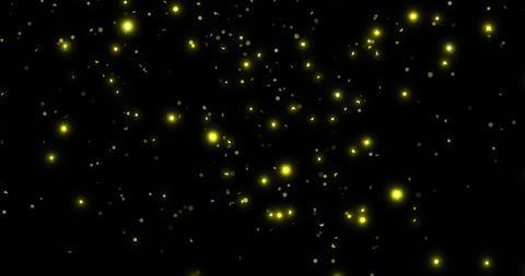 Floating Yellow Light Particles on Black Background - Download Free Stock Images Pikwizard.com