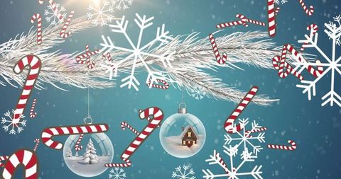 Festive candy canes and snowflakes adorning holiday branch