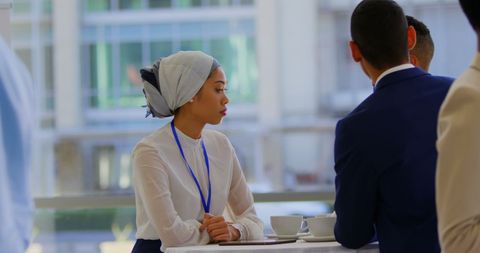 Young Business Professionals Networking at Seminar