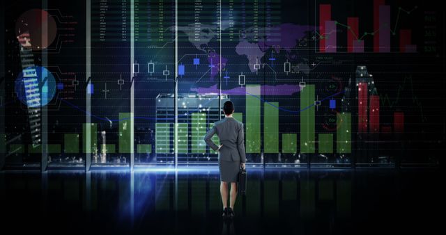 Businesswoman Analyzing Financial Data on Digital Screens in Modern Office - Download Free Stock Images Pikwizard.com