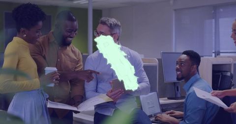 Diverse coworkers holding team meeting in modern office