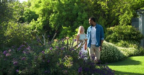 Happy Proposal in Sunny Garden Creating Emotive Moment