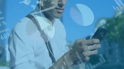 Man Utilizing Smartphones for Data Visualization on Urban Street