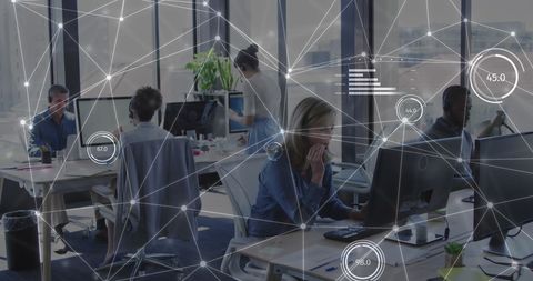 Businesspeople Utilizing Global Connection Networks in Modern Office - Download Free Stock Images Pikwizard.com