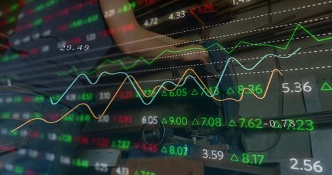 Financial Data Displays Over Woman in Industrial Setting