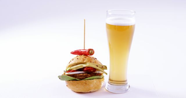 Gourmet Burger and Chilled Beer Glass in Clean White Space - Download Free Stock Images Pikwizard.com