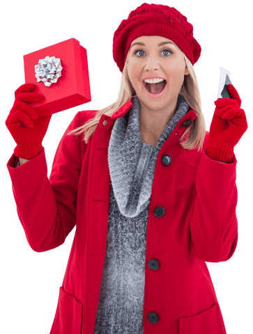 Excited Woman Presenting Gift Box with Silver Bow & Card, Winter Holiday Outfit