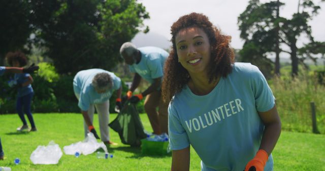 Diverse Group of Volunteers Cleaning Park on a Sunny Day - Download Free Stock Images Pikwizard.com