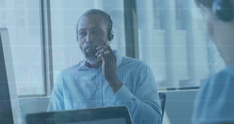 Diverse Businessman Analyzing Financial Data with Technology Overlay