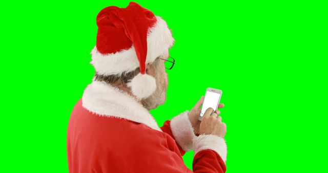 Santa Claus Using Smartphone Isolated on Green Screen - Download Free Stock Images Pikwizard.com
