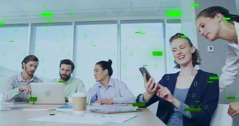 Business team collaborating in modern boardroom with digital overlay