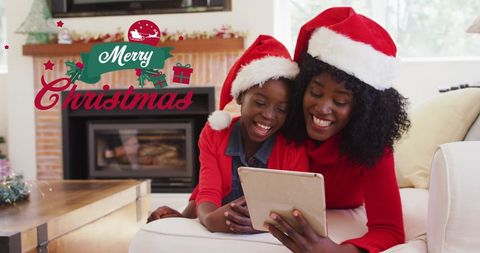 African American Mother and Son Having Cozy Christmas at Home