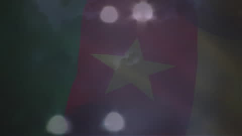 Cameroon Flag with Blurred Twilight Background