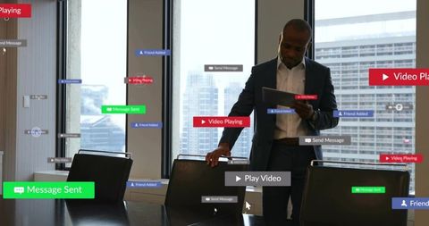 Executive navigating augmented reality alerts on tablet in boardroom with city skyline