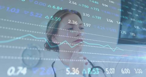 Female doctor analyzing clinical data overlay with charts, dashboard and stethoscope