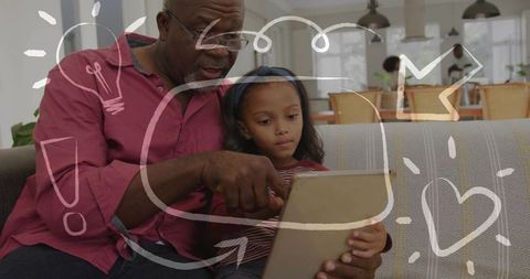 Grandparent guiding child on tablet with animated doodles for fun learning and bonding