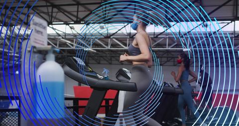 Women exercising on treadmills with tech overlays