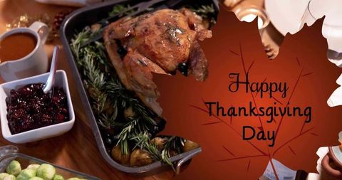 Roasted thanksgiving turkey with rosemary and cranberry sauce rustic holiday table