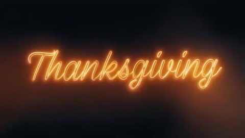 Glowing Thanksgiving Neon Script Emitting Warm Orange Halo and Smoky Vignette Motion Graphic