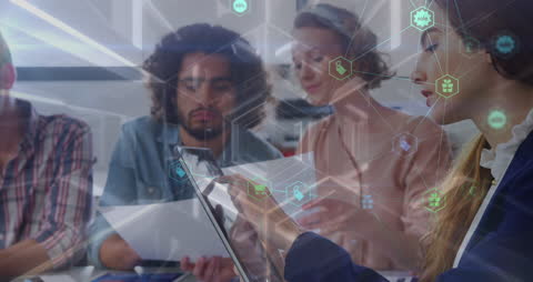 Diverse Creative Team Collaborating Windowed Technology Icons Overlay