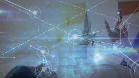 Digital Network Overlay on Woman Using Tablet