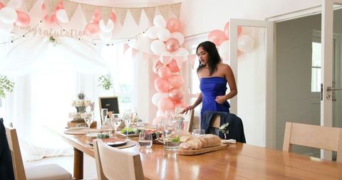 Celebration Preparation in Stylishly Decorated Dining Room