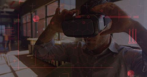 Senior Man Engaging with VR Technology in Office Environment