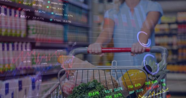 Image of graphs, trading boards over midsection of caucasian woman holding grocery filled cart. Digital composite, multiple exposure, report, business, shopping, retail and stock market concept.
