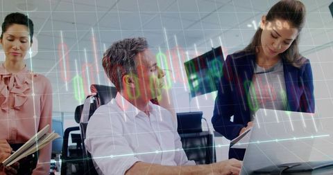 Executive team analyzing financial charts on laptop in open office with data overlay