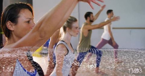 Dance class practicing lunges with raised arms and digital data overlay in studio
