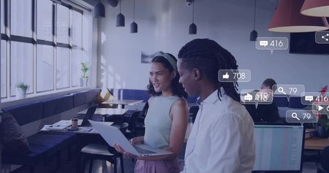 Coworkers Collaborating in Modern Office with Social Interactions