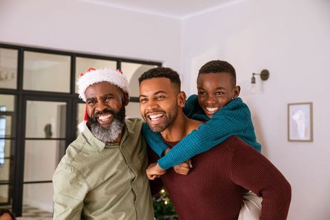 African American Family Joyful Christmas Celebration at Home