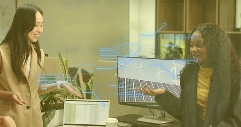 Professionals Discussing Renewable Energy Innovations in Modern Office