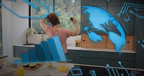Woman in kitchen using smartphone and headphones with augmented reality data overlay