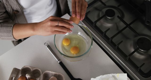 Person Cracking Eggs into Bowl for Cooking or Baking - Download Free Stock Images Pikwizard.com