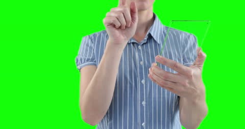 Woman Using Transparent Screen Tablet on Green Background