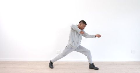 Energetic Dance Movement in Minimalist Room