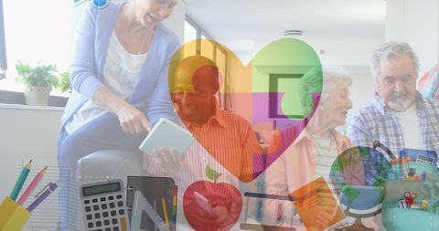 Family Gathering with Seniors Enjoying Tablet Technology Together