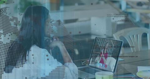 Woman Engaged in Virtual Meeting with Global Data Overlay