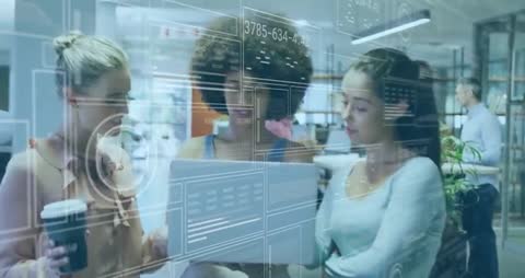 Diverse Team Discussing Digital Data Interfaces in Modern Office Environment