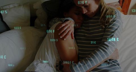 Women Embracing Amongst Digital Currency Overlay