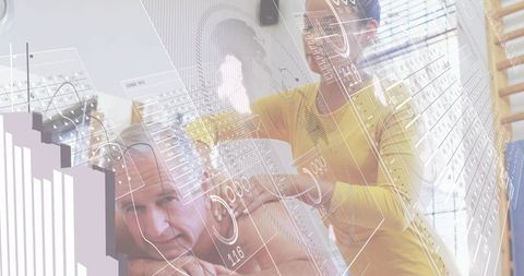 Physiotherapist applying manual therapy to senior man with hud overlay for rehabilitation