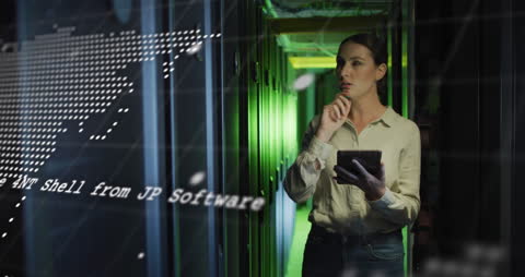 Focused Female Technician in Server Room Analyzing Data Interface