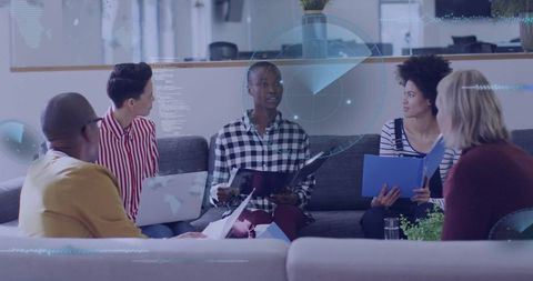 Diverse Team Collaborating in Modern Lounge Space