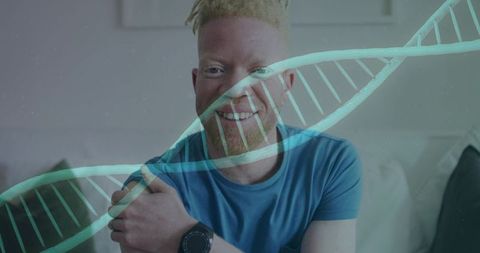 Smiling man wearing smartwatch at home with dna double helix overlay