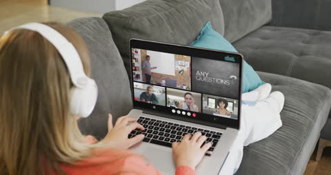 Woman Learning Online via Laptop Video Call for Education