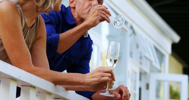 Couple Relaxing and Drinking Wine on Porch - Download Free Stock Images Pikwizard.com