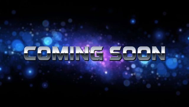 Futuristic 'coming soon' sign with glowing bokeh lights